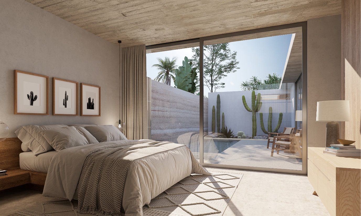 Overhead shot of a vast residential community with houses, roads, and green spaces.